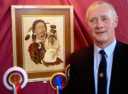 John Jeggo with his Rosebowl-Winning Picture Marquetarian with marquetry picture