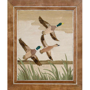 marquetry picture of ducks in flight